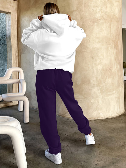 Ensemble survêtement femme blanc et violet motif géométrique