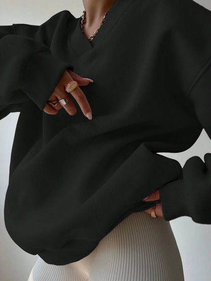 Pull col V femme noir décontracté manches longues