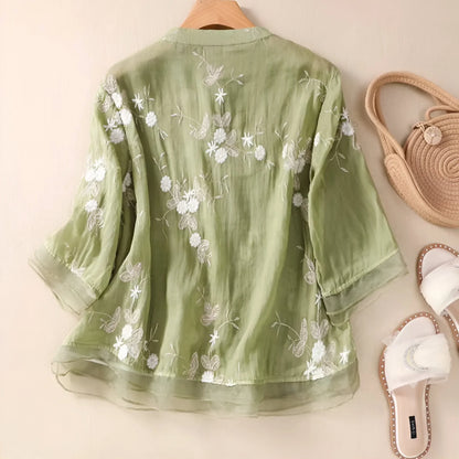 Blusa amplia con bordados florales para mujer, estilo elegante y versátil