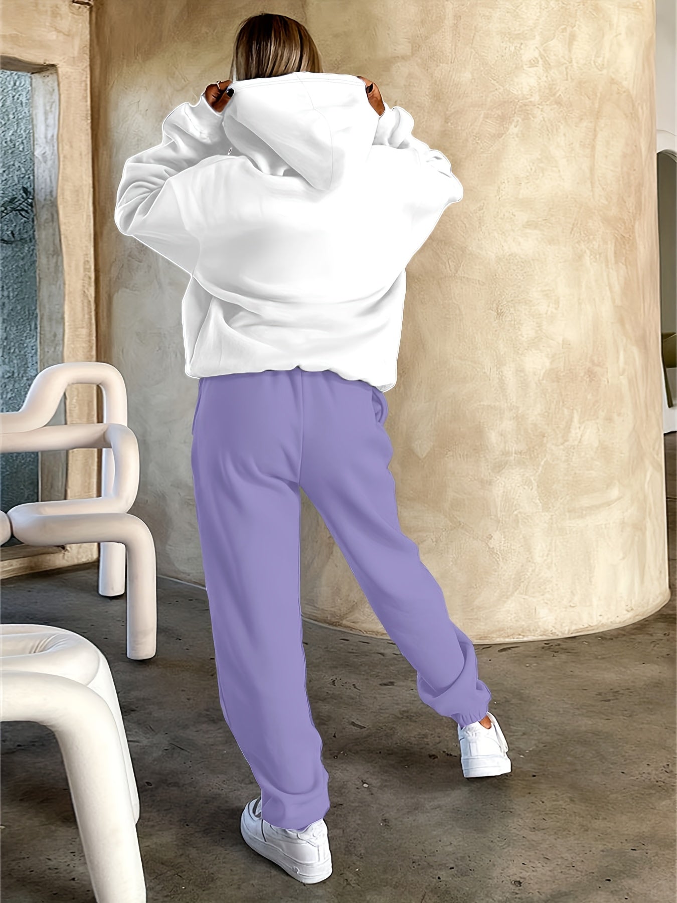 Ensemble survêtement femme blanc et violet motif géométrique