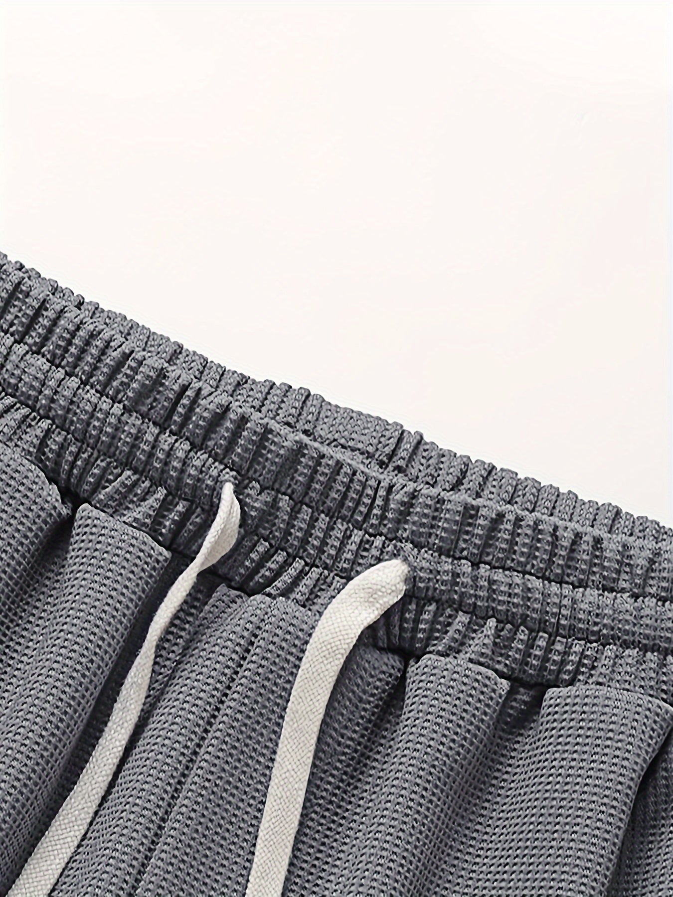 Completo uomo informale due pezzi maglietta larga e pantaloncini stile urbano ideale per relax e uscite