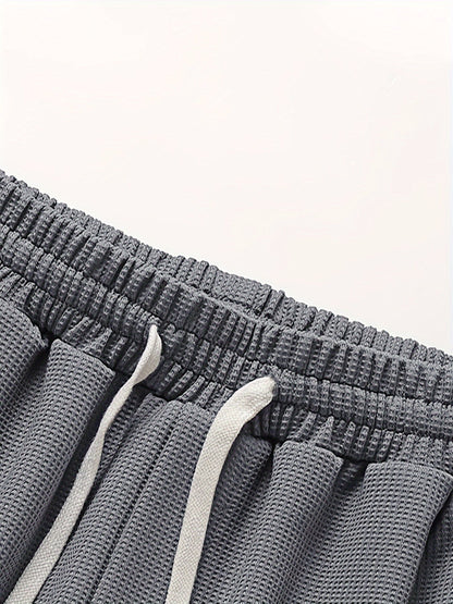 Completo uomo informale due pezzi maglietta larga e pantaloncini stile urbano ideale per relax e uscite