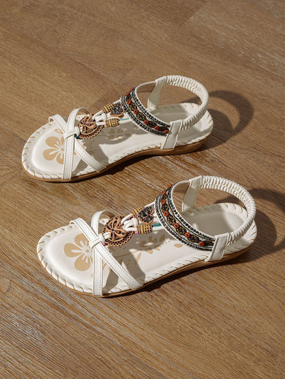 Ruby – Sandalen mit Blumen und Strasssteinen