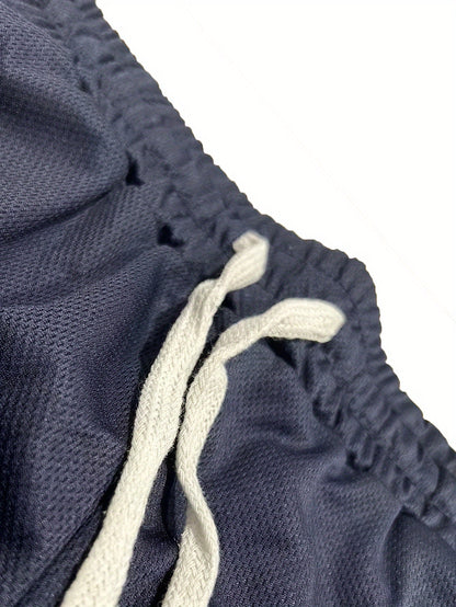 Short de sport homme style basket inscription HIT HARD – Look urbain et performance