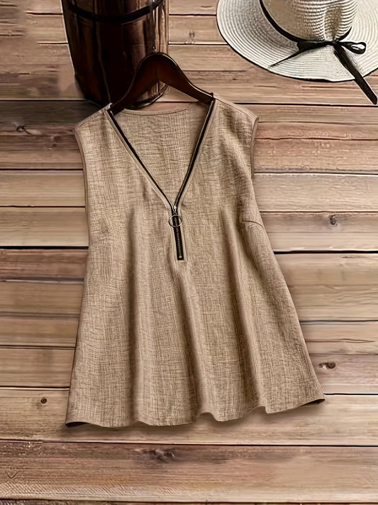 Women's sleeveless blouse with modern style and zip neckline for a stylish casual look