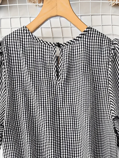 Rutig blus i avslappnad stil för kvinnor, perfekt för vår och sommar