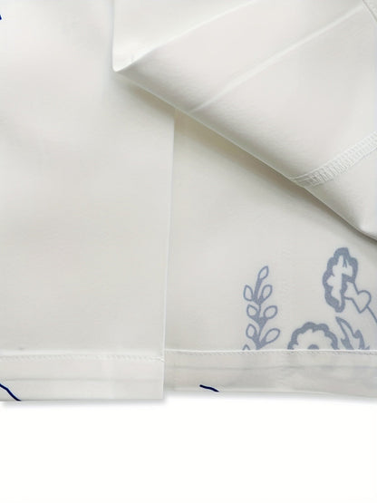 Herreskjorte i resortstil med korte ærmer og moderne grafisk blomsterprint