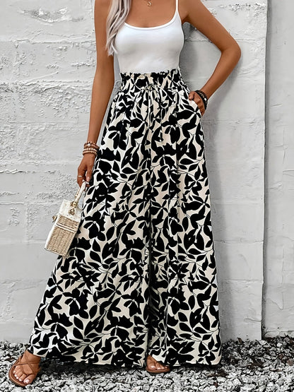 Pantalon large femme style bohème chic taille haute à imprimé feuillage pour occasions estivales et sorties élégantes