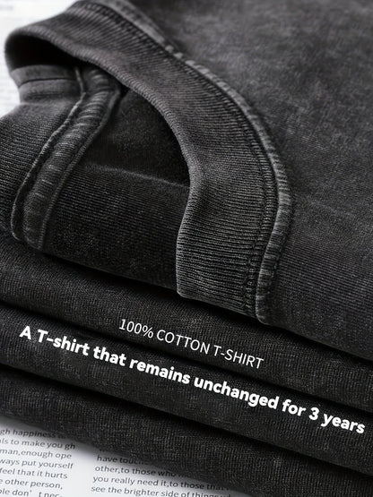 Sweat-shirt oversize délavé noir avec imprimé graphique épée ailée au dos