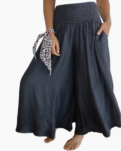 Pantaloni larghi a vita alta stile bohémien per donna, taglio fluido e comodo, ideali per tutti i giorni e il relax