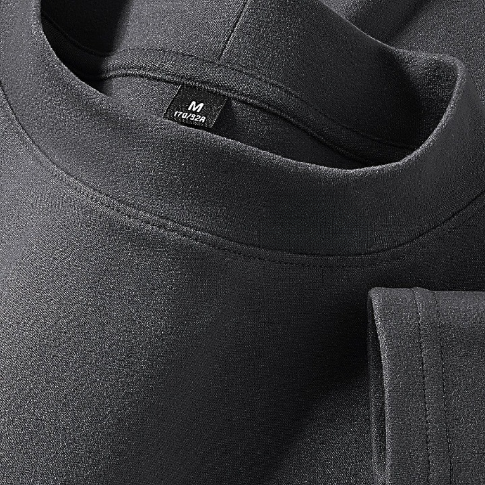 Haut à col montant doux couleur unie manches longues pour homme