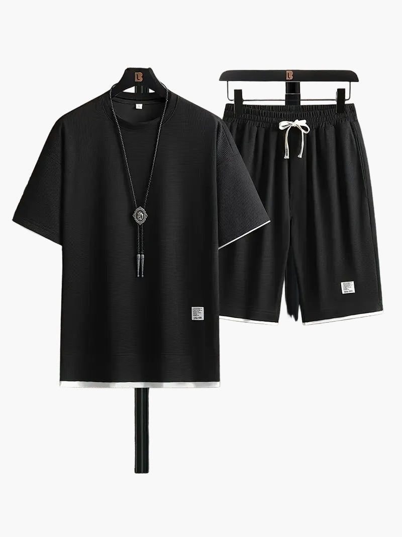 Completo uomo informale due pezzi maglietta larga e pantaloncini stile urbano ideale per relax e uscite