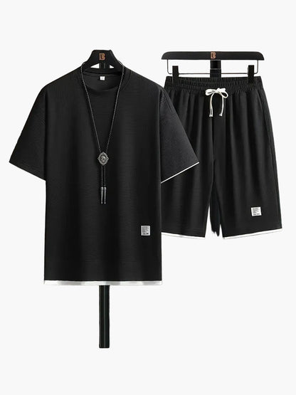 Completo uomo informale due pezzi maglietta larga e pantaloncini stile urbano ideale per relax e uscite