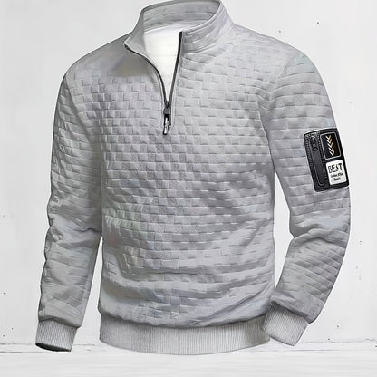 Pull homme matelassé motif géométrique avec col montant zippé et patch manche