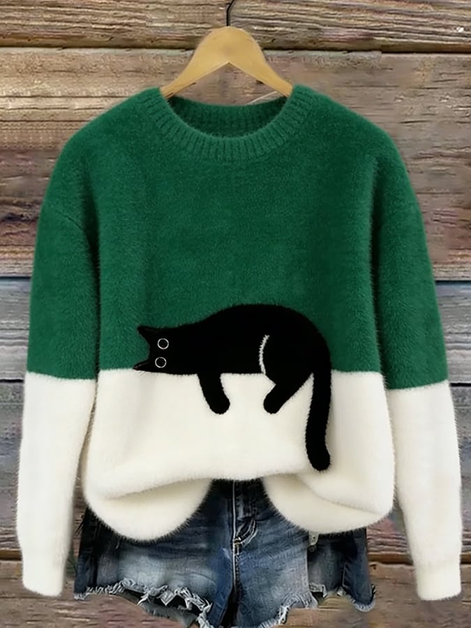 Cozy two-tone sweater with black cat motif, long sleeves and crew neck