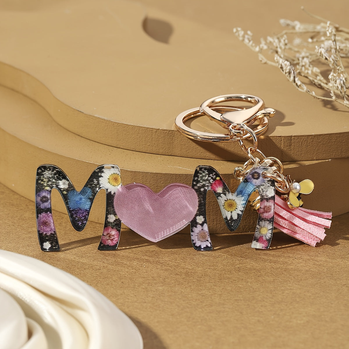 Portachiavi donna stile trendy per la festa della mamma con motivo floreale e cuore