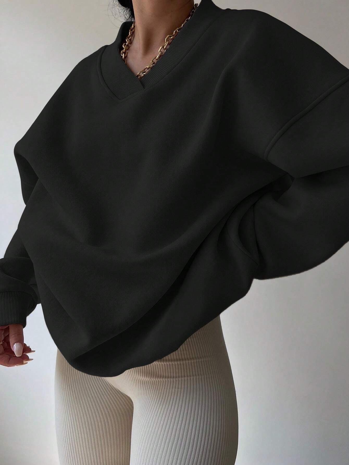 Pull col V femme noir décontracté manches longues