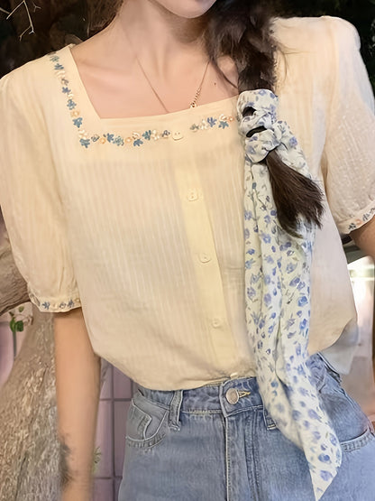 Elegant women's blouse with square neckline and floral embroidery, casual spring-summer style