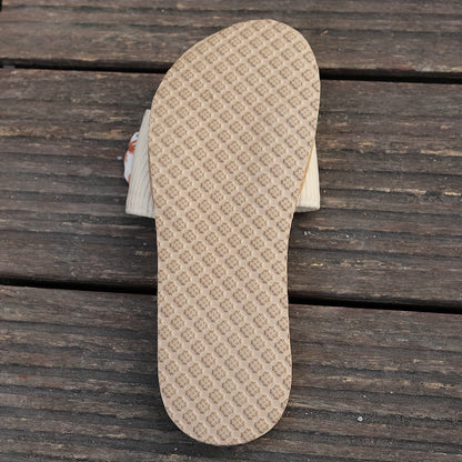 Damtofflor i espadrillestil med stor elegant blommig rosett för sommaren