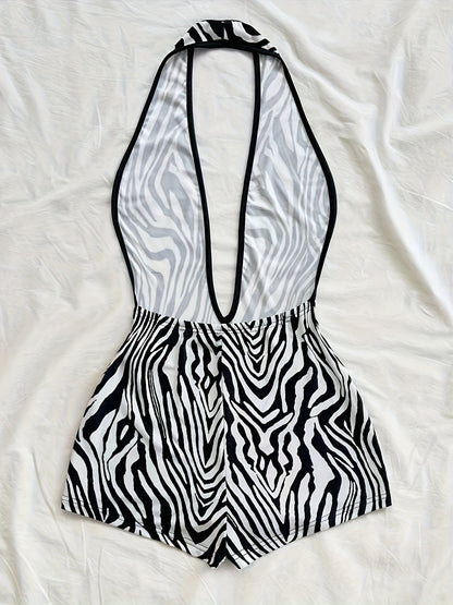 Combinaison short une pièce femme style animalier, décolleté plongeant, tendance été, idéale plage et vacances