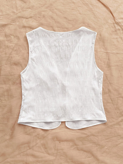 Gilet sans manches femme style bohème à nouer devant pour look décontracté et estival