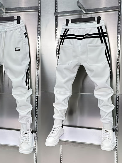 Pantalon de jogging homme avec cordon de serrage, rayures latérales et boutons pression, coupe fuselée