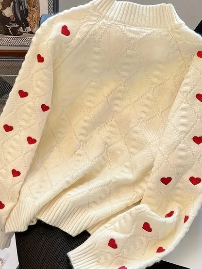 Pull femme crème à cœurs rouges, col montant, maille texturée