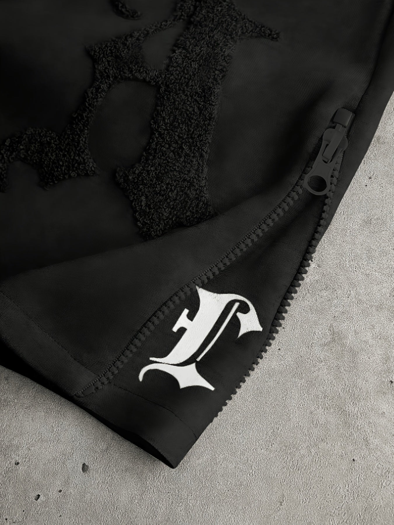 Pantalon de jogging ample brodé noir pour homme