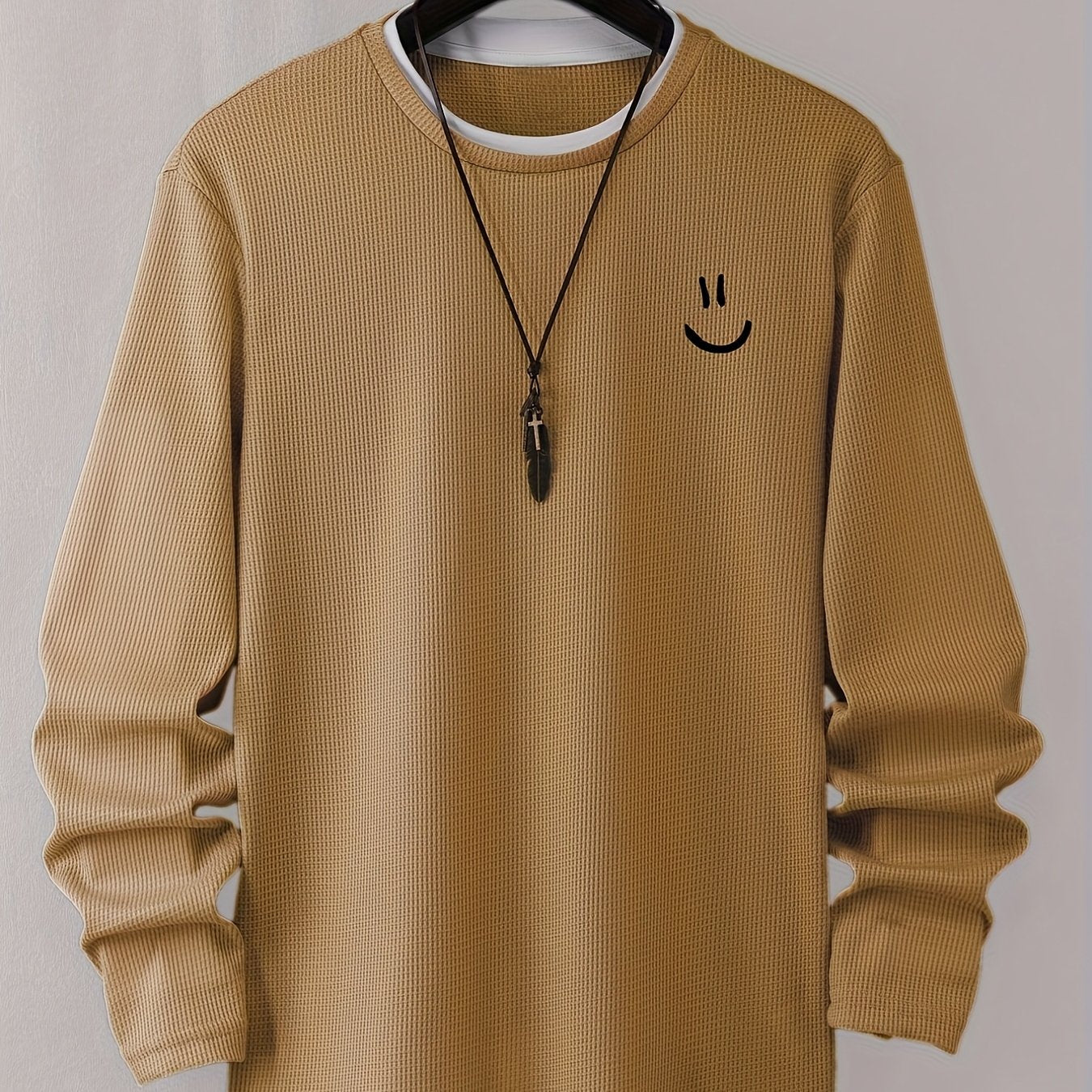 Pull homme texturé gaufré manches longues imprimé smiley col rond