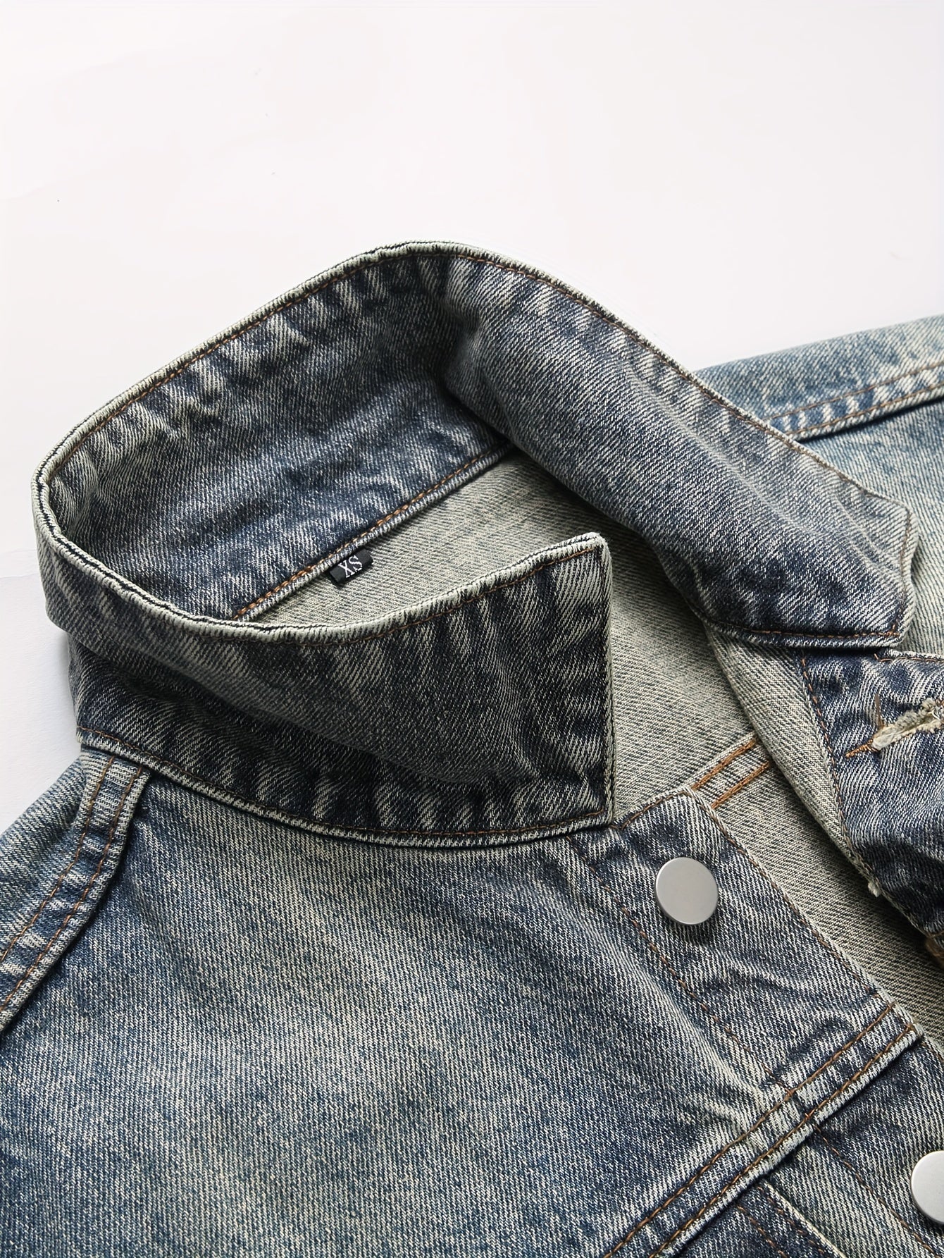 Veste sans manches en denim délavé bleu pour homme avec boutons et poches