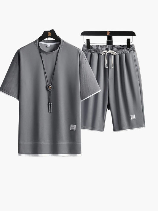 Ensemble décontracté homme deux pièces t-shirt ample et short style urbain idéal détente et sorties