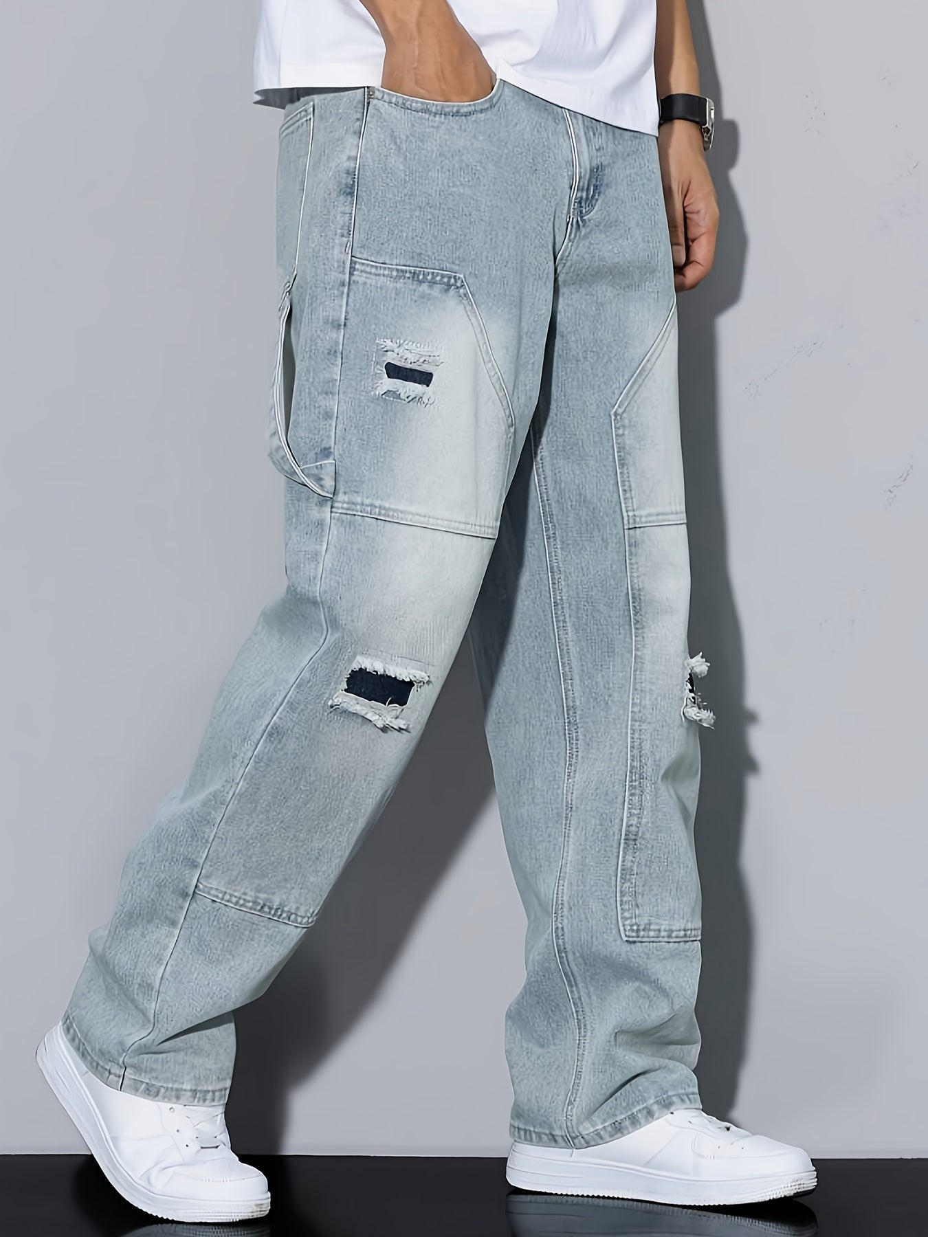 Loszittende cargo jeans voor heren met wijde pasvorm en versleten details - Trendy urban stijl