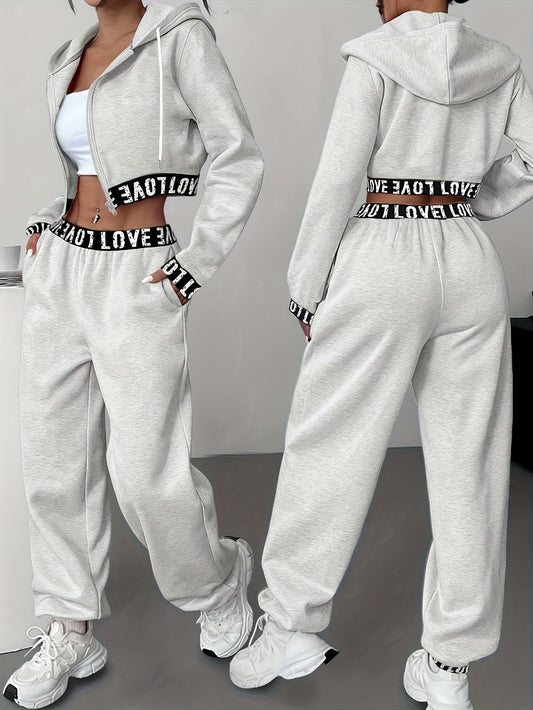 Ensemble survêtement femme crop top à capuche et pantalon large couleur unie