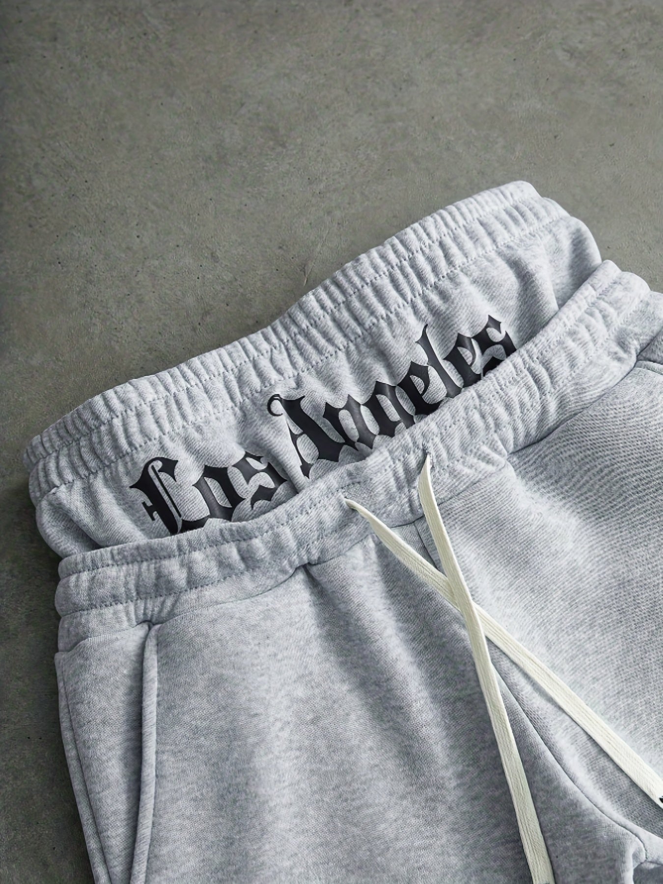 Pantalon de jogging ample brodé noir pour homme