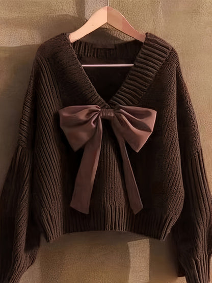 Pull en maille côtelée col V avec grand nœud décoratif pour femme