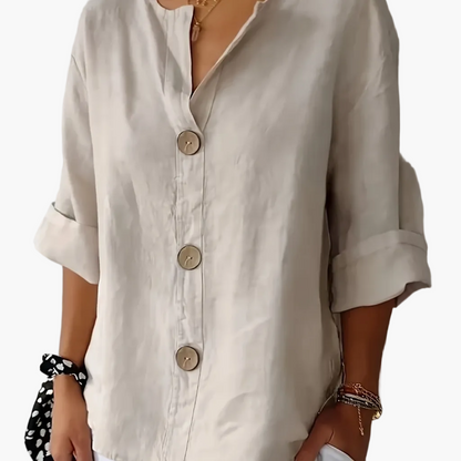 Afslappet damebluse med knapper i elegant og alsidig stil