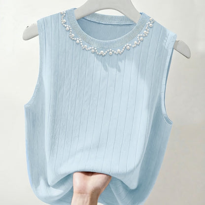 Elegante dames mouwloze top met parelmoerlook en ronde hals, geschikt voor uitgaan of kantoor