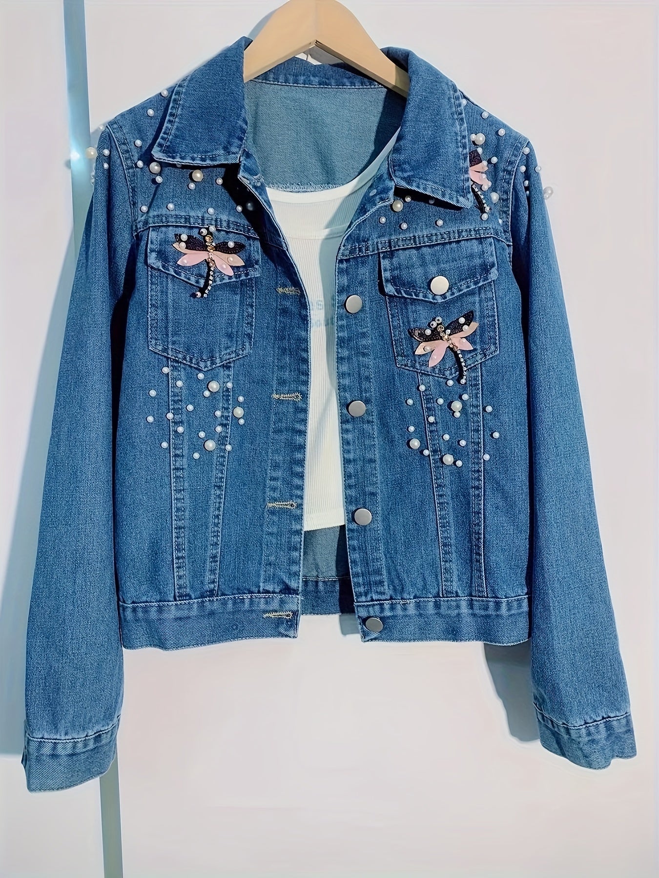 Veste en jean femme bleue brodée de perles et ornements