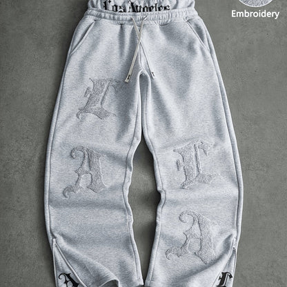 Pantalon de jogging ample brodé noir pour homme