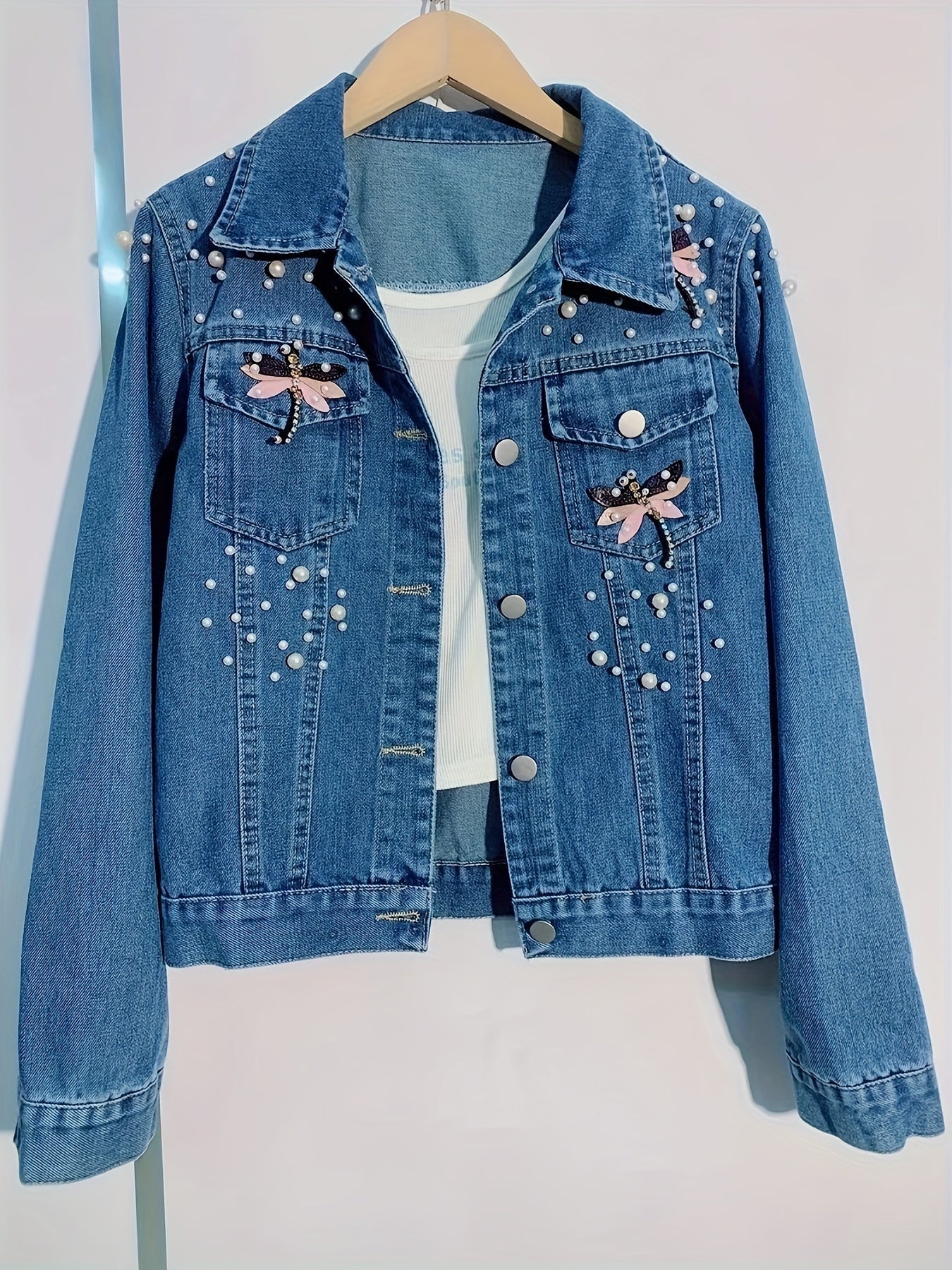 Veste en jean femme bleue brodée de perles et ornements