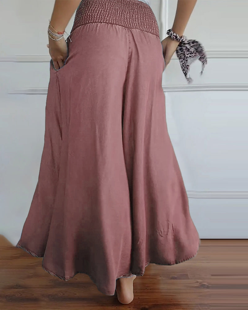 Pantaloni larghi a vita alta stile bohémien per donna, taglio fluido e comodo, ideali per tutti i giorni e il relax