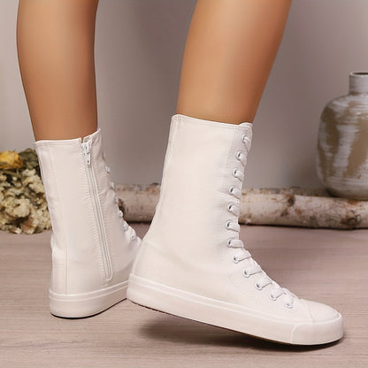 Bottes montantes type basket blanches à lacets et fermeture éclair latérale