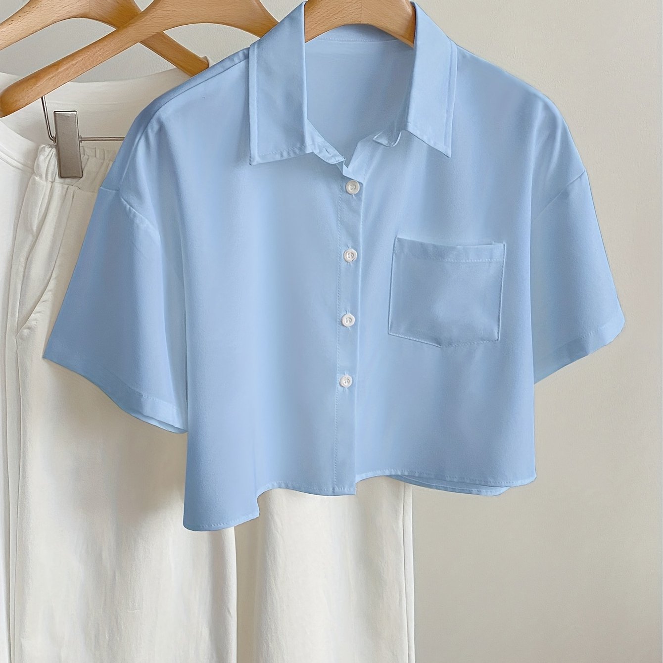 Camicia casual donna maniche corte stile moderno con orlo corto