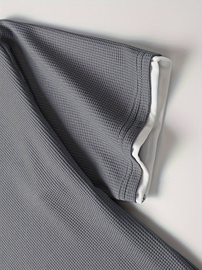 Completo uomo informale due pezzi maglietta larga e pantaloncini stile urbano ideale per relax e uscite