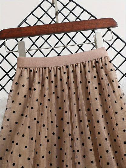 Gonna midi elegante a pois da donna, stile svasato chic, ideale per primavera ed estate