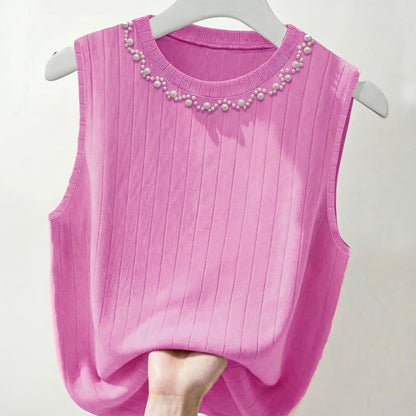 Elegante dames mouwloze top met parelmoerlook en ronde hals, geschikt voor uitgaan of kantoor