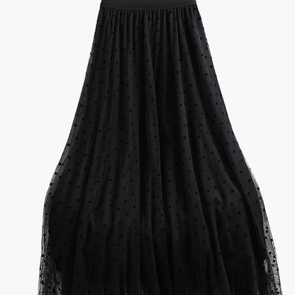 Gonna midi elegante a pois da donna, stile svasato chic, ideale per primavera ed estate