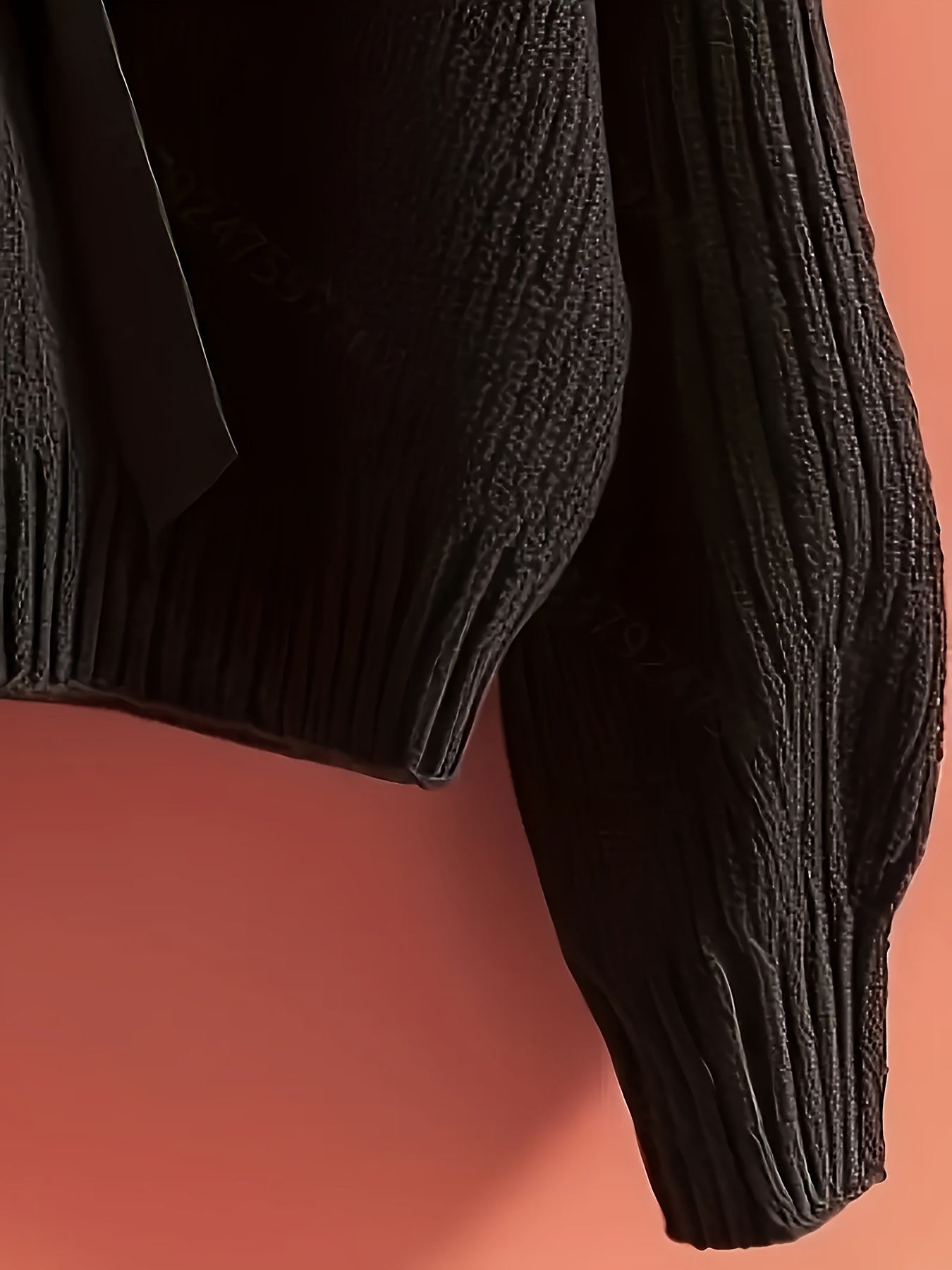 Pull en maille côtelée col V avec grand nœud décoratif pour femme