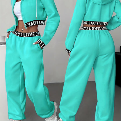 Ensemble survêtement femme crop top à capuche et pantalon large couleur unie