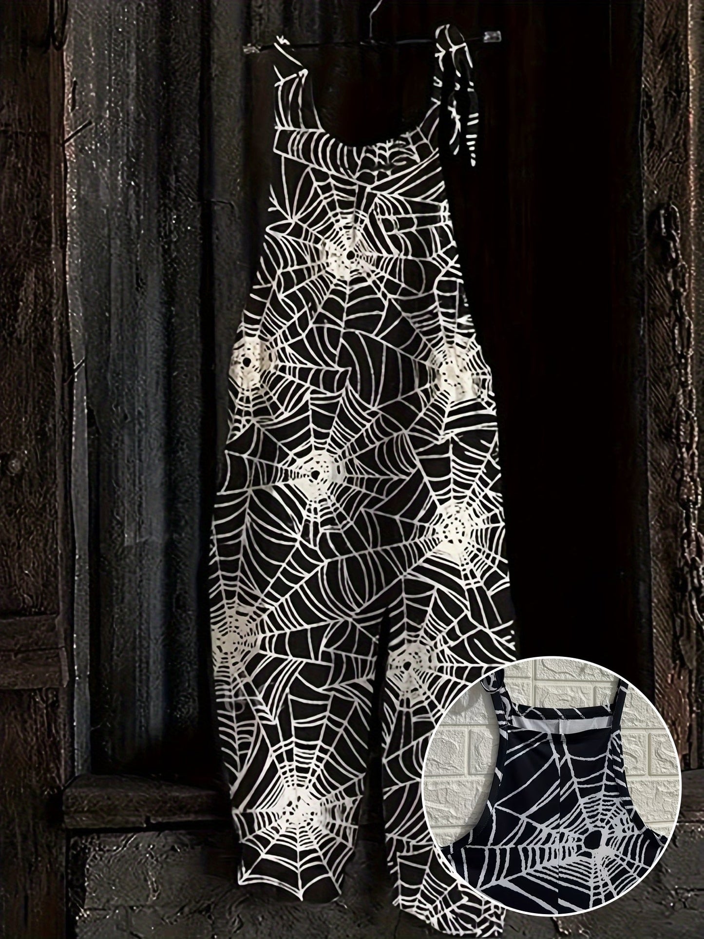 Combinaison pantalon femme noire à motif toile d'araignée bretelles fines